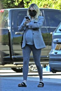 Emma Roberts in a Grey Blazer