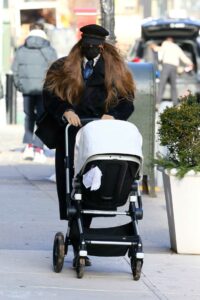 Gigi Hadid in a Black Cap