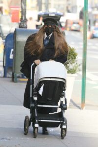 Gigi Hadid in a Black Cap