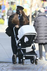 Gigi Hadid in a Black Cap