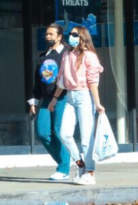 India Eisley in a Pink Sweatshirt