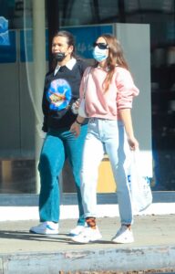 India Eisley in a Pink Sweatshirt