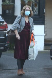 Jacqui Smith in a Purple Dress