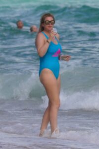 Josie Goldberg in a Blue Adidas Swimsuit