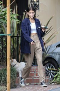 Kaia Gerber in a Beige Pants