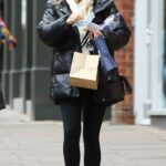 Lauren Pope in a Black Puffer Jacket Enjoys Some Christmas Shopping in London 12/12/2020