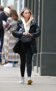 Lauren Pope in a Black Puffer Jacket