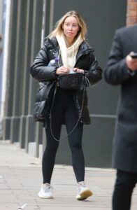 Lauren Pope in a Black Puffer Jacket