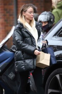 Lauren Pope in a Black Puffer Jacket