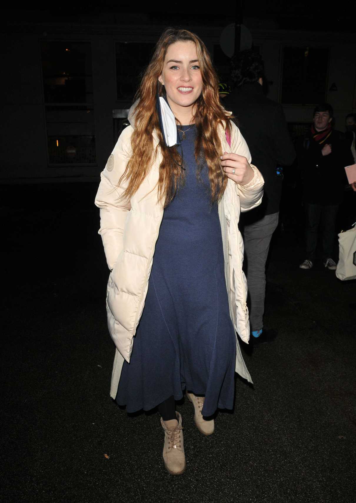 Lucie Jones in a Beige Puffer Coat