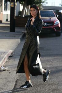 Nicole Williams in a Black Leather Coat