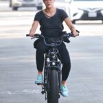 Peta Murgatroyd in a Black Cap Rides Her Electric Bike Back Home in Studio City 11/30/2020
