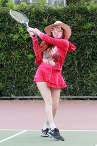 Phoebe Price in a Pink Outfit