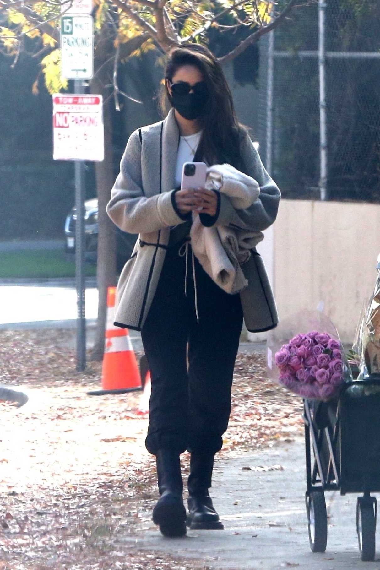 Shay Mitchell in a Black Protective Mask