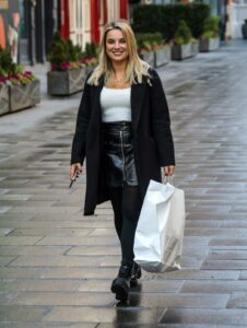 Sian Welby in a Black Coat