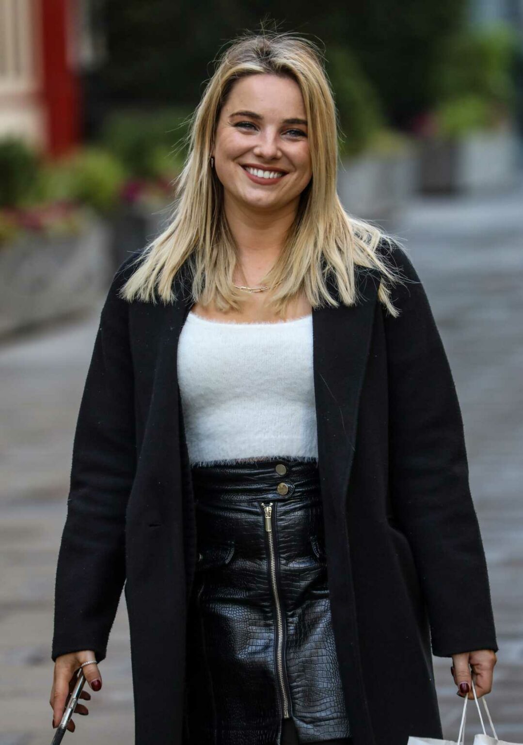 Sian Welby in a Black Coat Leaves the Global Radio Studios in London 12