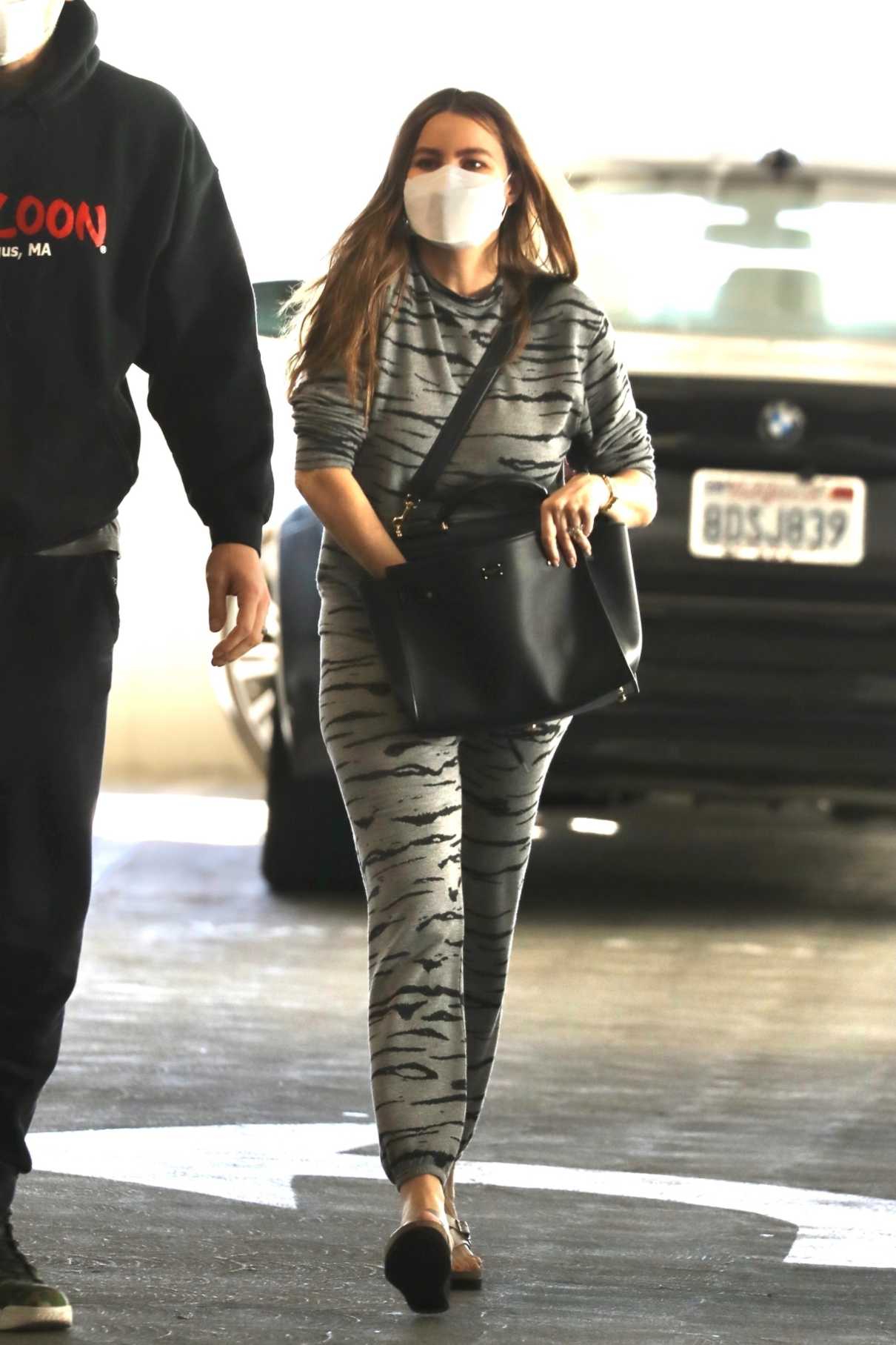 Sofia Vergara in a Grey Animal Print Sweatsuit