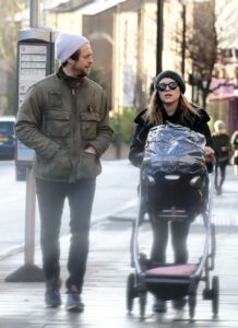 Sophie Cookson in a Black Beanie Hat