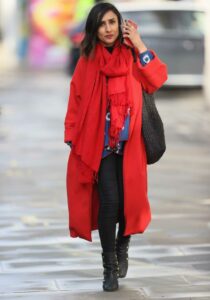 Anita Rani in a Bright Red Coat