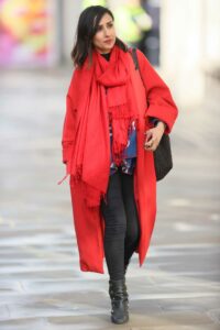 Anita Rani in a Bright Red Coat