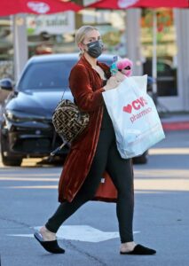Ashlee Simpson in a Black Protective Mask