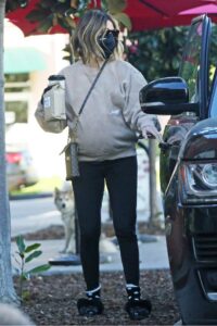 Ashley Tisdale in a Beige Sweatshirt