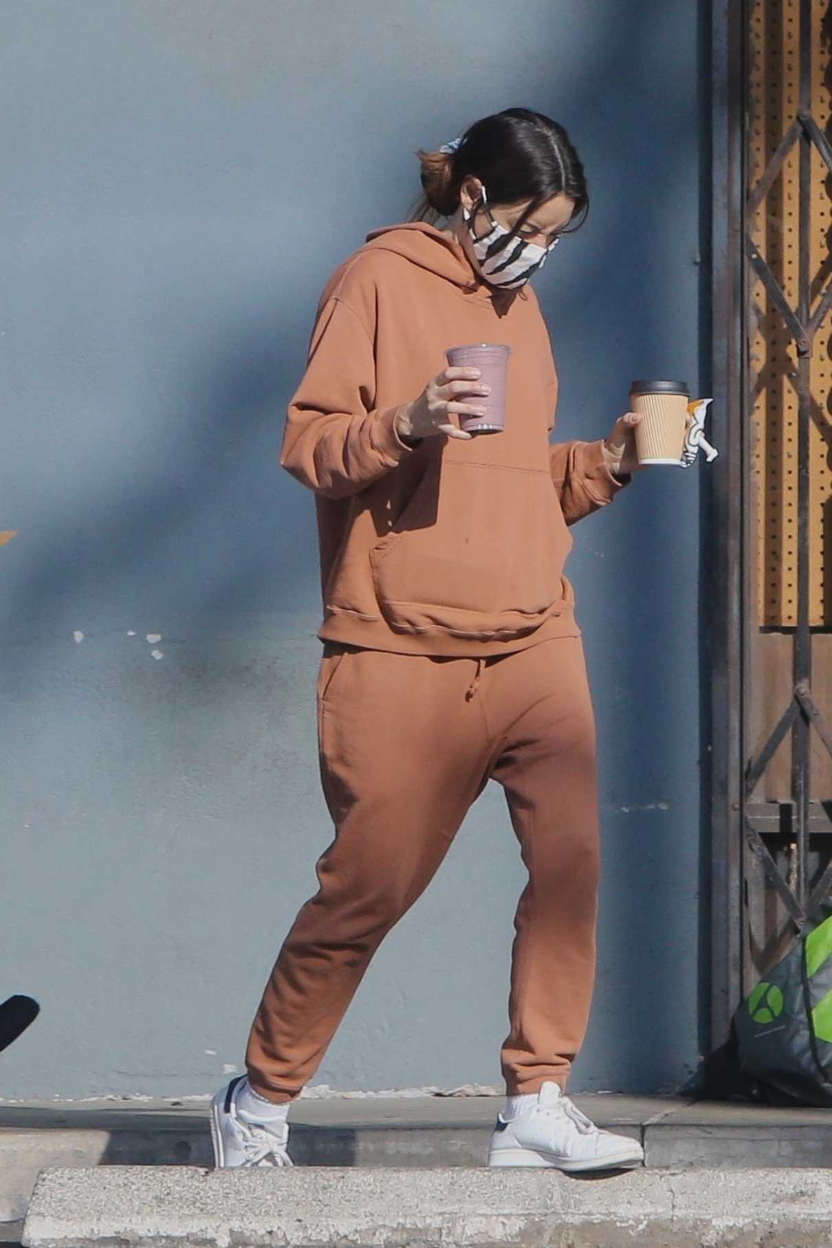 Aubrey Plaza in a Tan Sweatsuit