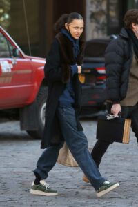 Binx Walton in a Black Coat