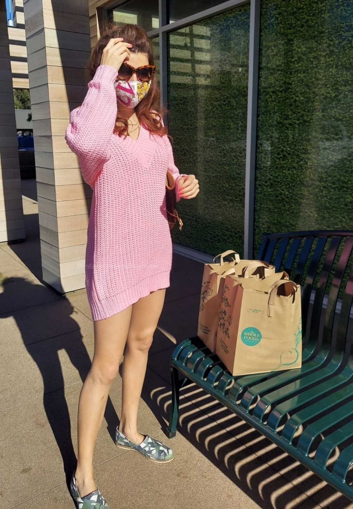 Blanca Blanco in a Pink Sweater