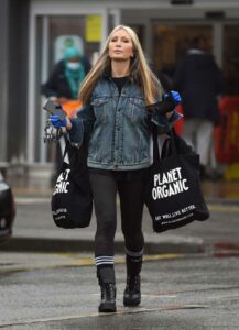 Caprice Bourret in a Blue Denim Jacket