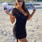 Claudia Romani in a Black Bikini on the Beach in Miami 01/06/2021