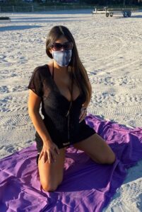 Claudia Romani in a Black Bikini