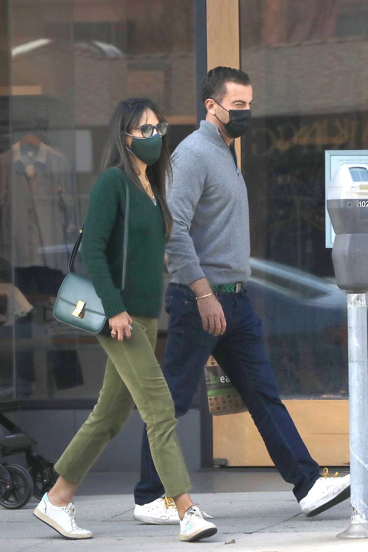 Jordana Brewster in an Olive Pants