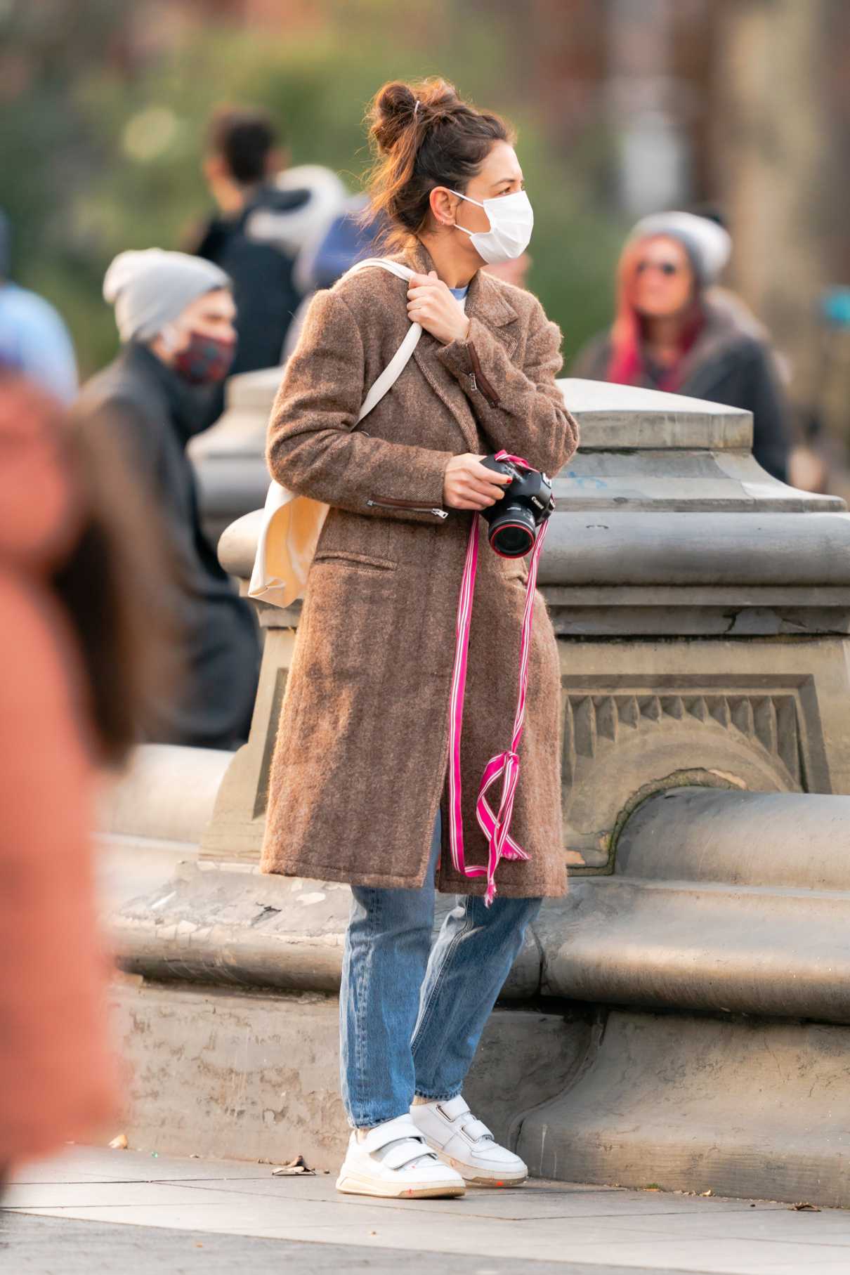 Katie Holmes in a Tan Coat Shows off Her Photography Skills in New York