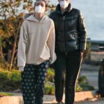 Laura Dern in a Black Puffer Jacket Enjoys a Walk with Her Daughter Jaya Harper in Pacific Palisades 01/01/2021