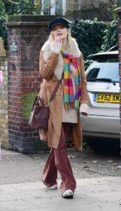 Laura Whitmore in a Beige Trench Coat