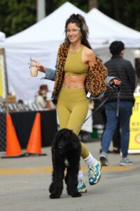 Lexy Panterra in an Olive Workout Ensemble
