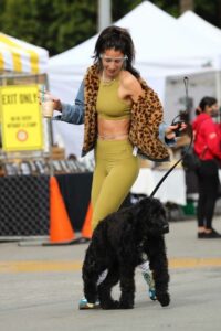 Lexy Panterra in an Olive Workout Ensemble