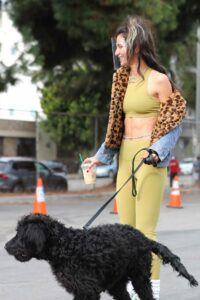 Lexy Panterra in an Olive Workout Ensemble