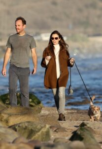 Lily Collins in a Brown Jacket