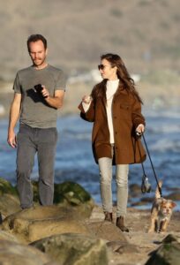 Lily Collins in a Brown Jacket