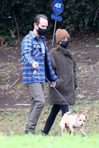 Lily Collins in a Tan Beanie Hat