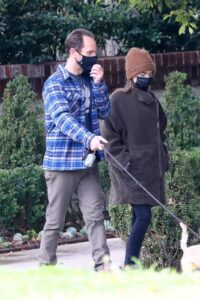 Lily Collins in a Tan Beanie Hat