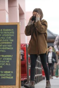 Lily Collins in a Tan Jacket