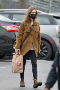 Lily Collins in a Tan Jacket