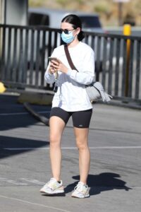 Lucy Hale in a Black Spandex Shorts