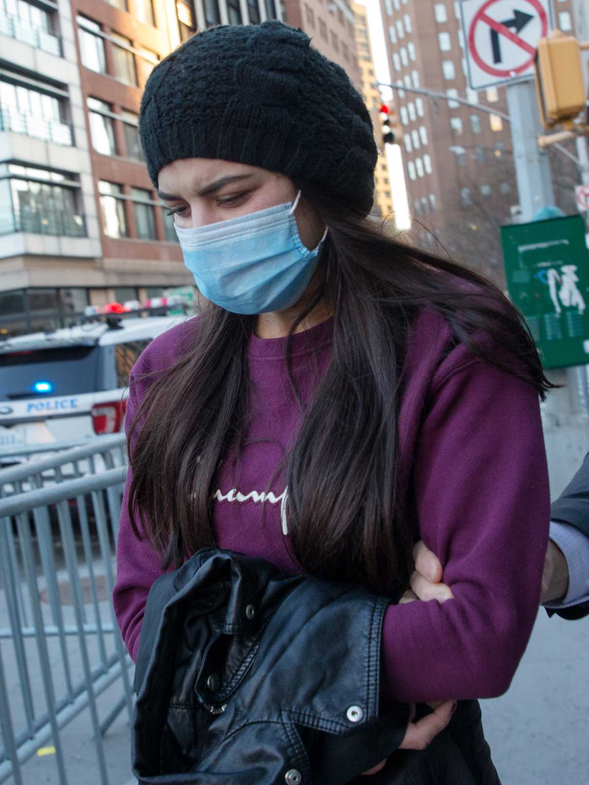 Miya Ponsetta in a Purple Sweatshirt