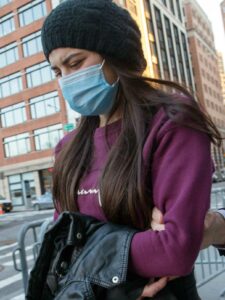 Miya Ponsetta in a Purple Sweatshirt