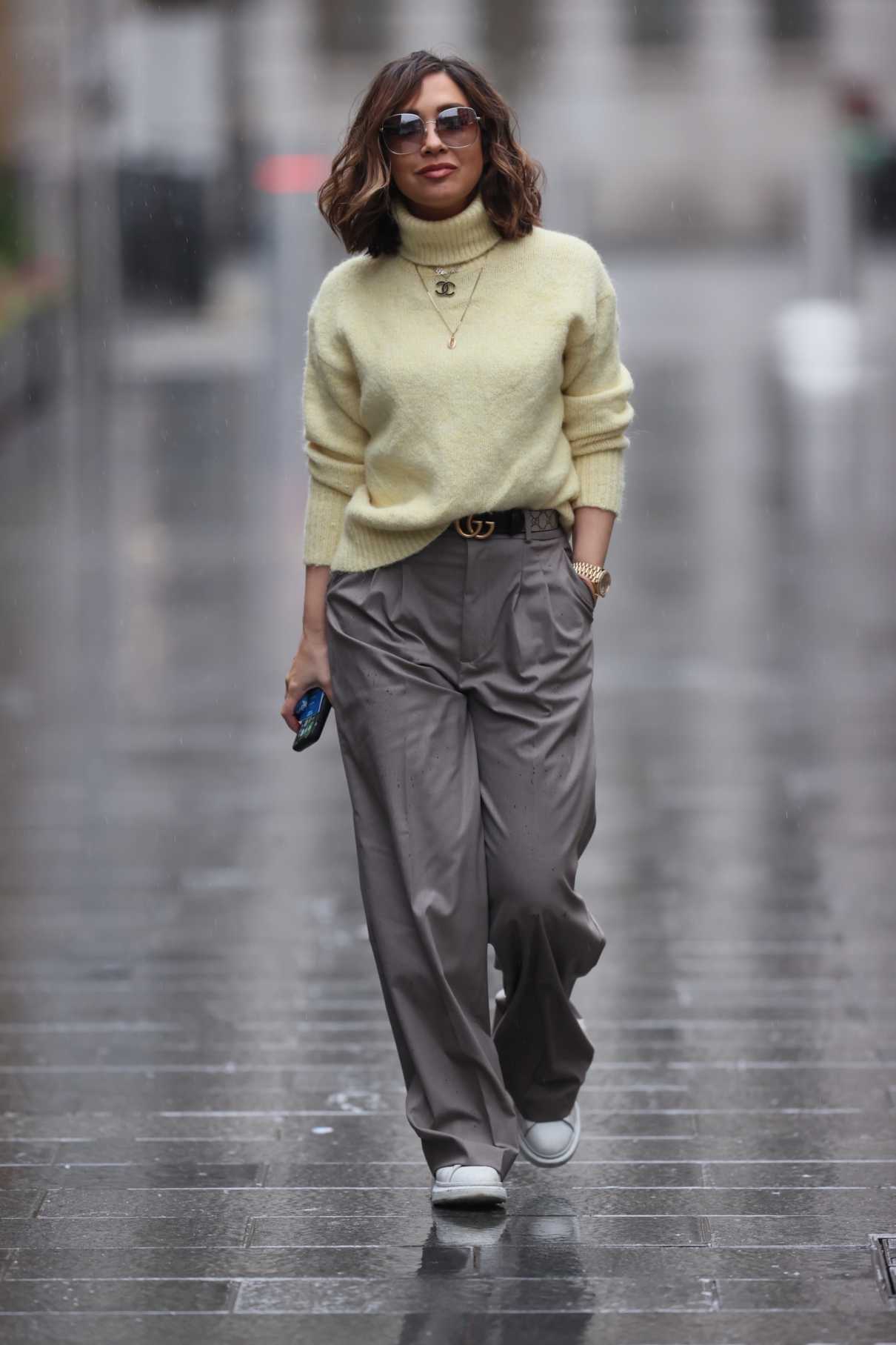 Myleene Klass in a Yellow Knit Turtleneck