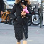 Padma Lakshmi in a Black Puffer Coat Carrying Her Chihuahua in Manhattan’s East Village, NYC 01/22/2021